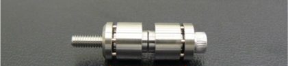 Damping device / damper